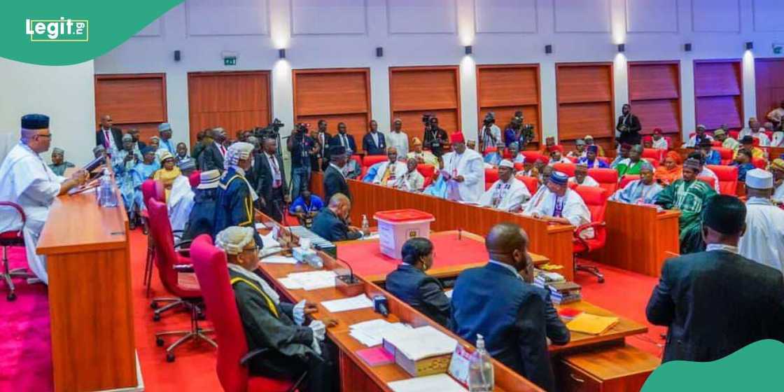 Tinubu and federal lawmakers sign old national anthem