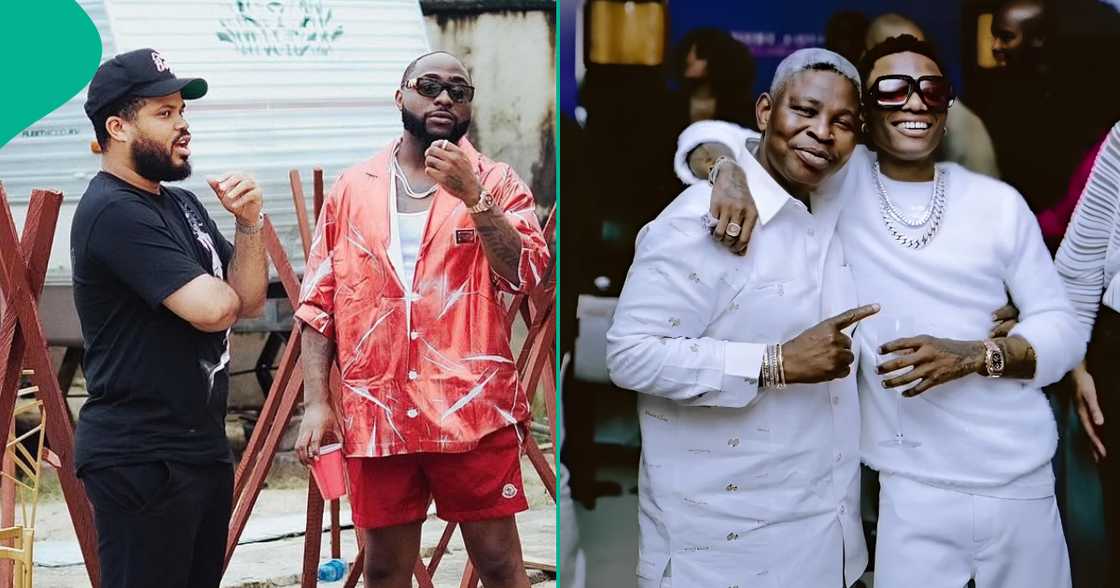 Davido and Wizkid hang out with their managers. Davido and Wizkid hang out with their managers.