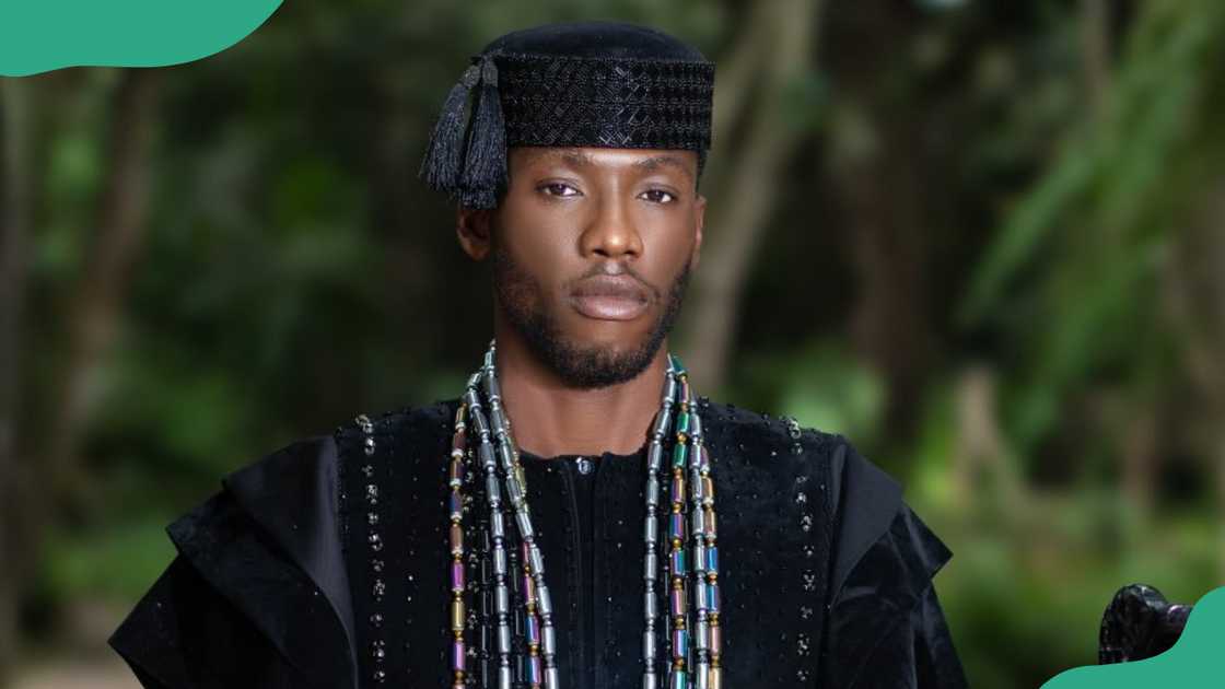 Kayikunmi from BBNaija in a black traditional Nigerian attire.