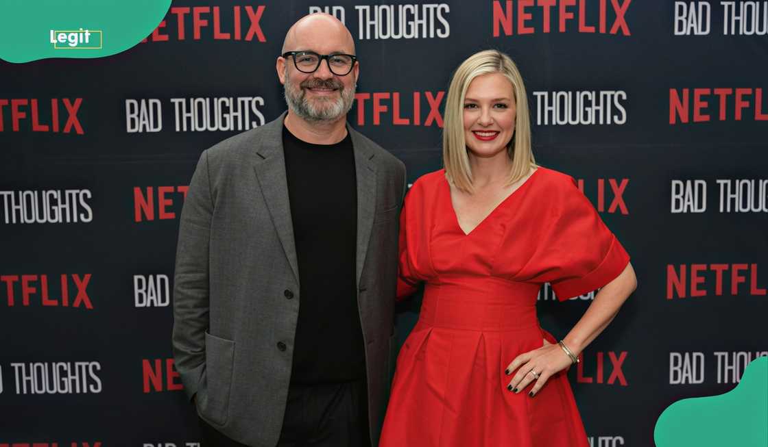 Tom Segura and Christina Pazsitzky pose on the red carpet of a film premiere Tom Segura and Christina Pazsitzky pose on the red carpet of a film premiere