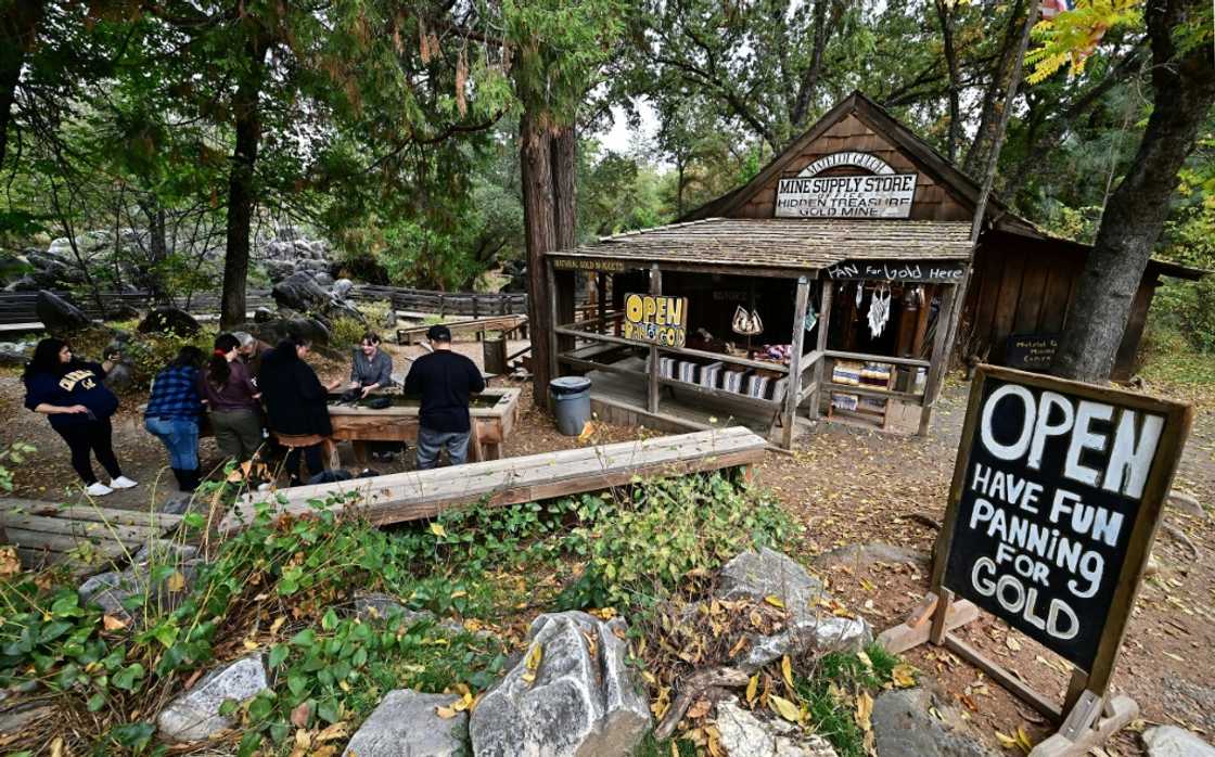 People pan for gold at the Matelot Gulch Mining Company in Columbia State Historic Park, a preserved Gold Rush settlement People pan for gold at the Matelot Gulch Mining Company in Columbia State Historic Park, a preserved Gold Rush settlement