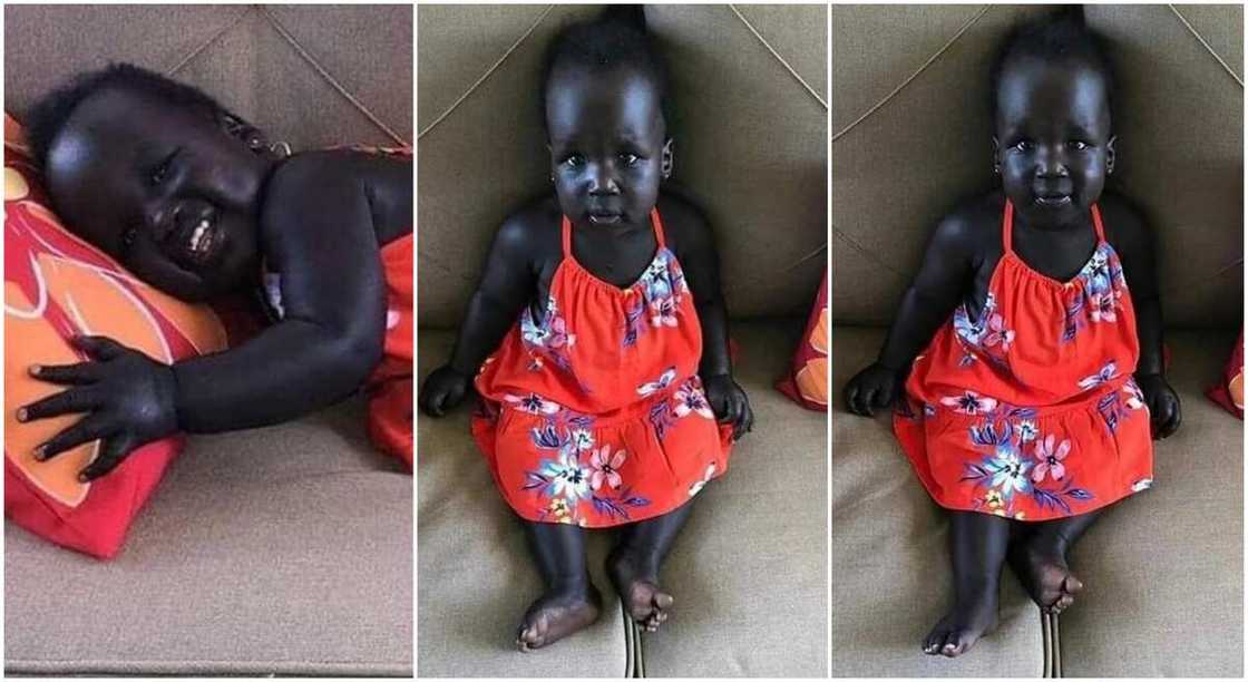 Little girl with shinning black skin. Little girl with shinning black skin.