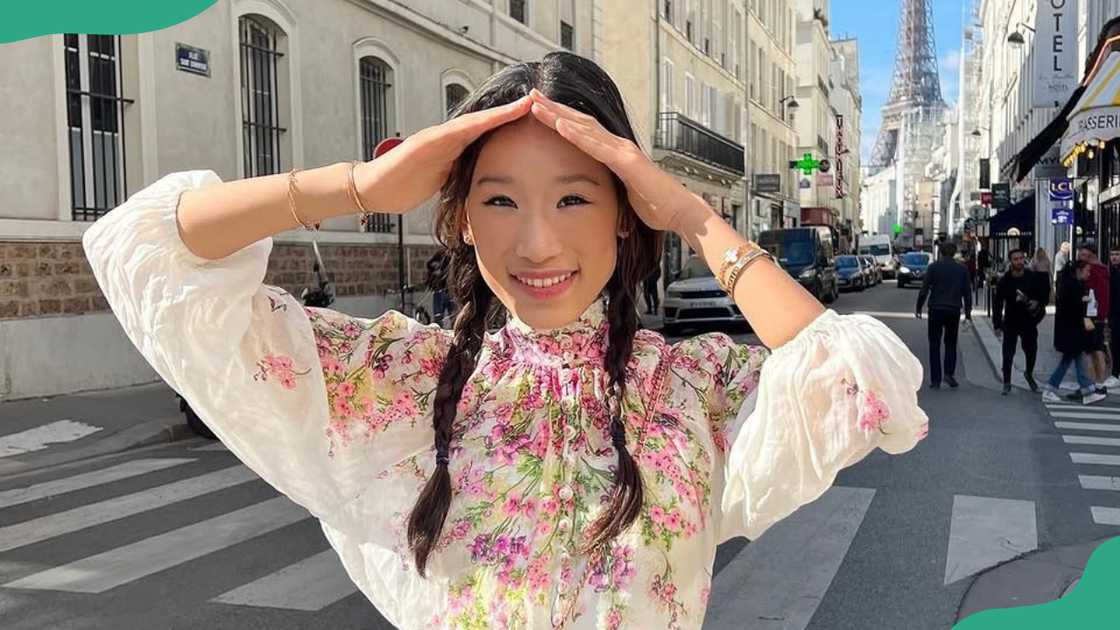 Rebecca Ma poses on a street