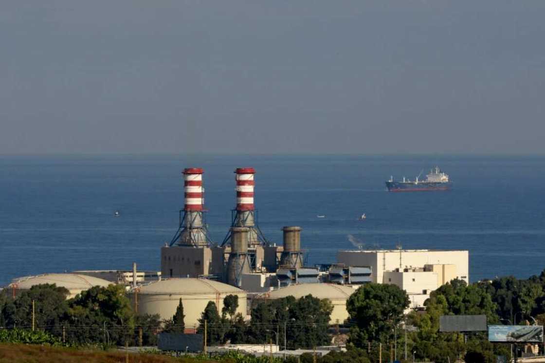 A tanker carrying fuel oil from Iraq is anchored off the Zahrani power plant near the southern Lebanese city of Sidon (Saida) on September 18, 2021 A tanker carrying fuel oil from Iraq is anchored off the Zahrani power plant near the southern Lebanese city of Sidon (Saida) on September 18, 2021