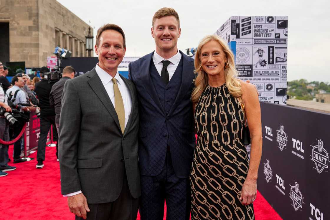 Will Levis and his parents posing on the red carpet Will Levis and his parents posing on the red carpet