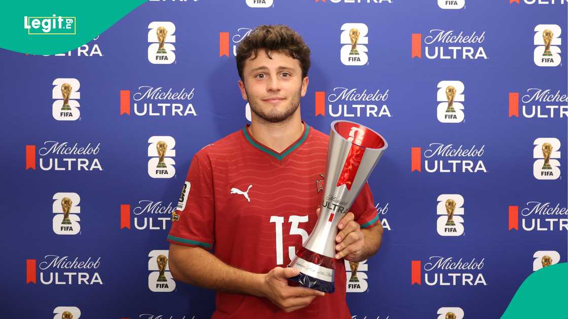 Joao Neves poses with the Player of the Match award after the match against Congo DR. Photo by Julian Finney