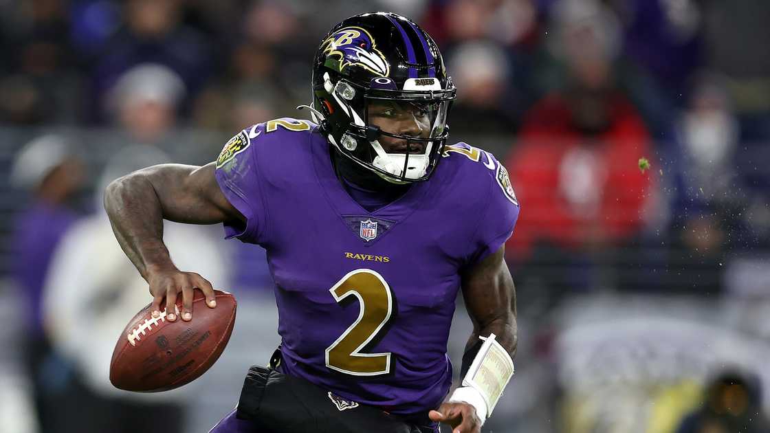 Tyler Huntley drops his hand back to make a pass during a game. Tyler Huntley drops his hand back to make a pass during a game.