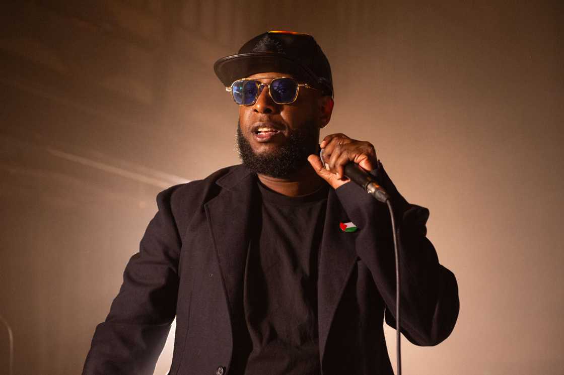 Talib Kweli onstage during a concert in London, England Talib Kweli onstage during a concert in London, England