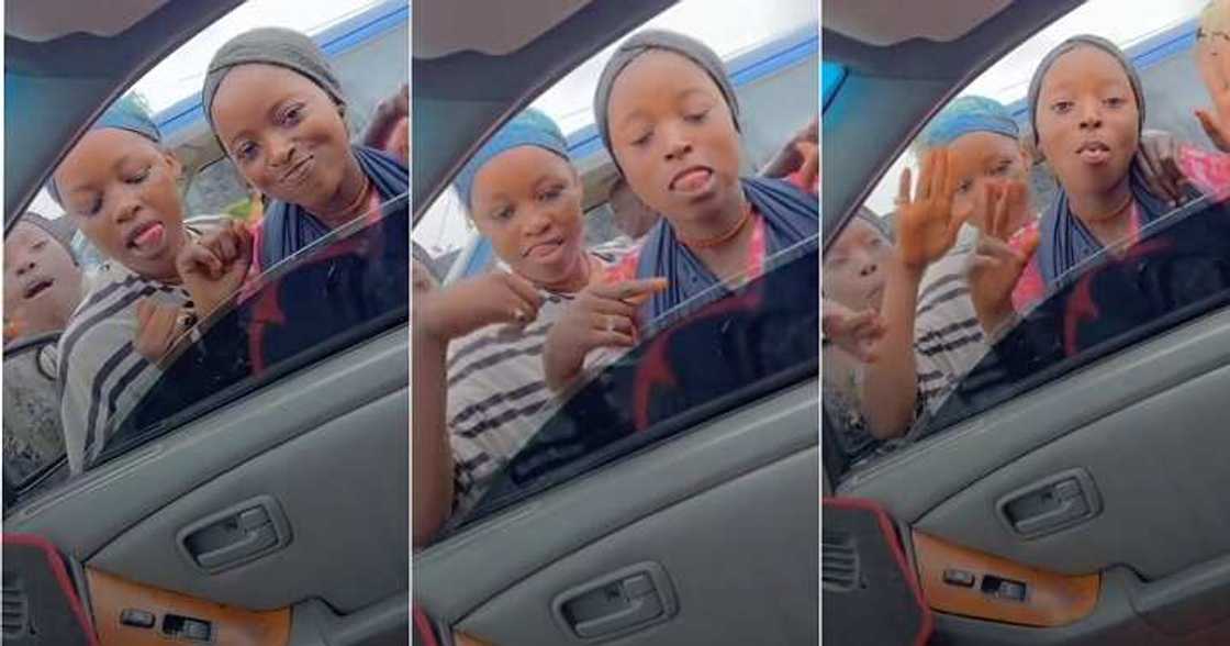 Girls approach man in traffic Girls approach man in traffic