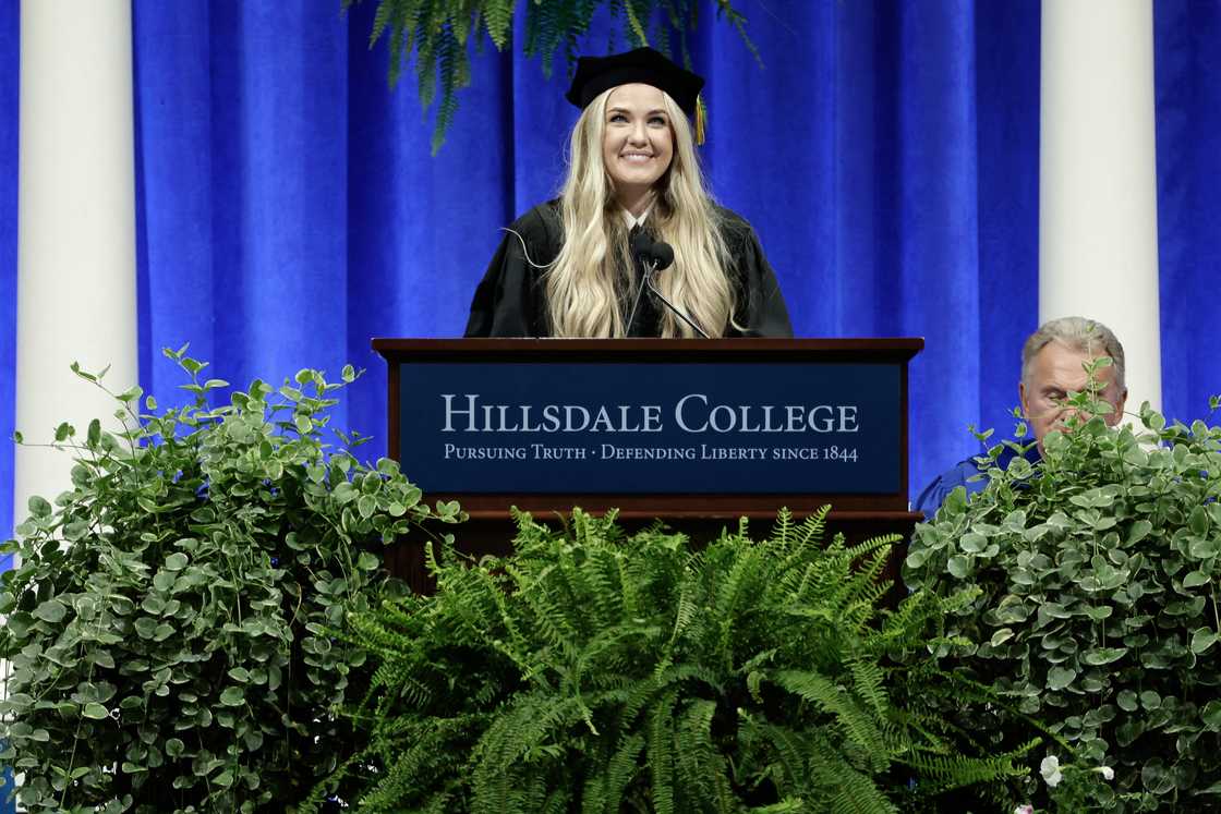 Erika Kirk delivers a commencement address at Hillsdale College during the college's 174th commencement ceremony in Hillsdale