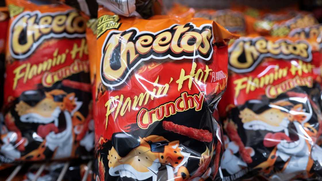 Bags of Flamin' Hot Cheetos on display. Bags of Flamin' Hot Cheetos on display.
