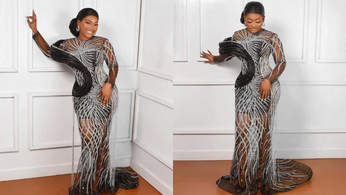 An elegant lace gown with a short underdress An elegant lace gown with a short underdress