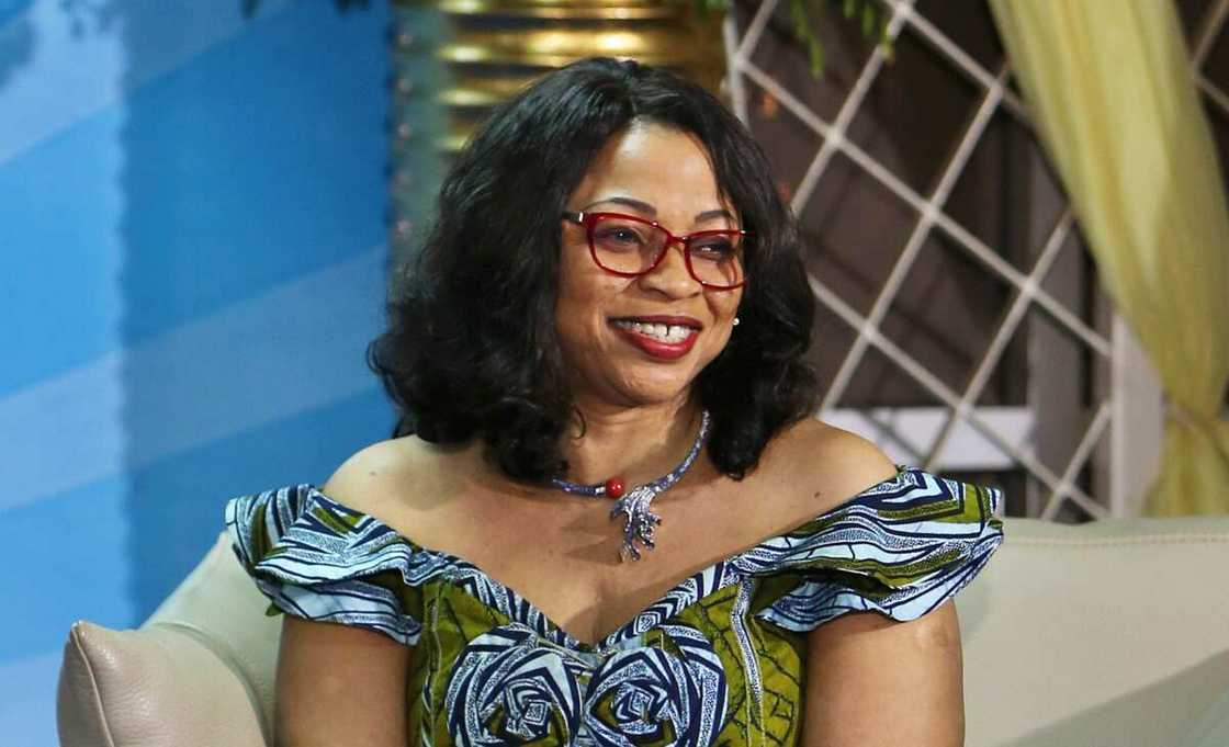 Folorunso Alakija, Nigeria's richest woman, applauds on stage in front of the congregation of the Rose of Sharon Glorious Ministry in Lagos