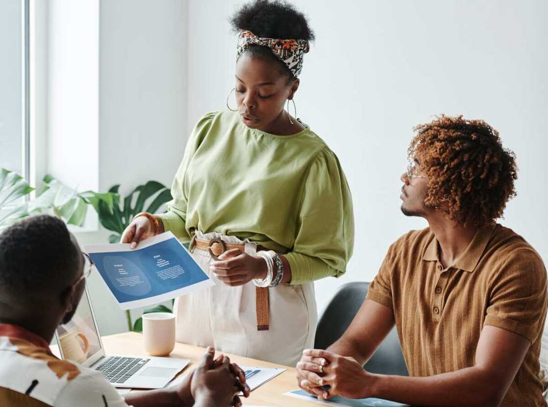Two guys and a lady are making a plan Two guys and a lady are making a plan