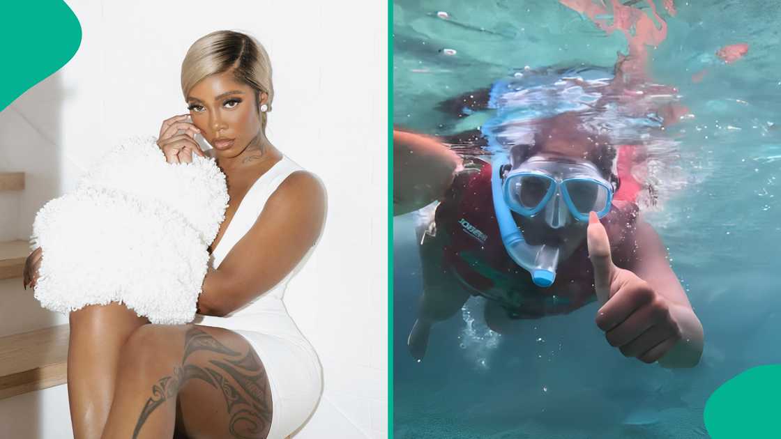 Tiwa Savage swims under water with sharks