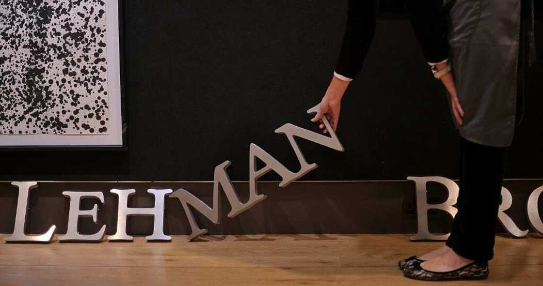 The defunct Lehman Brothers company sign is sold at Christie's auction house in London The defunct Lehman Brothers company sign is sold at Christie's auction house in London
