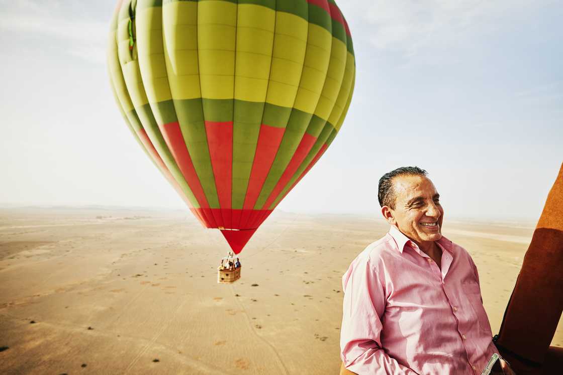 A man on an early hot air balloon ride