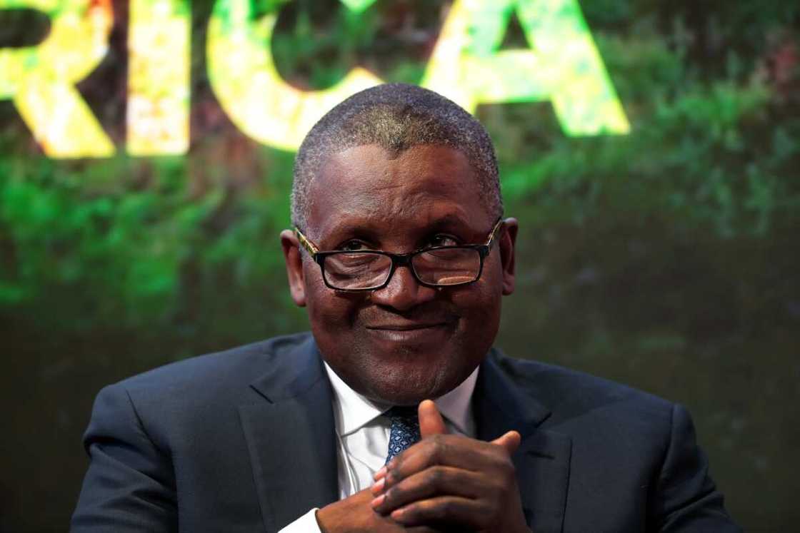 Aliko Dangote, billionaire and chief executive officer of Dangote Group, reacts during a panel session at the World Economic Forum (WEF) in Davos, Switzerland