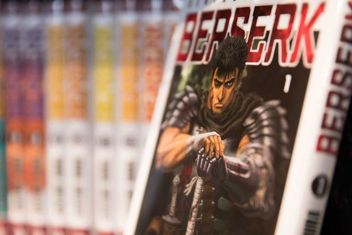 Volumes of the Berserk manga with dark cover art lined up on a shelf at the Paris Book Fair, 2019 Volumes of the Berserk manga with dark cover art lined up on a shelf at the Paris Book Fair, 2019