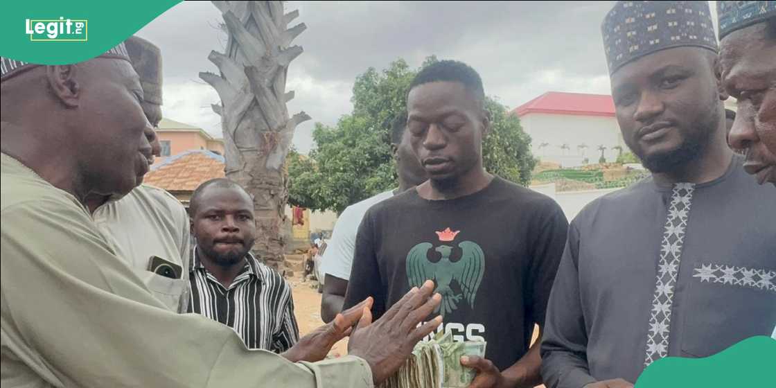 Residents of Anguwan Rukuba gather after rescuing victims during the crisis Residents of Anguwan Rukuba gather after rescuing victims during the crisis