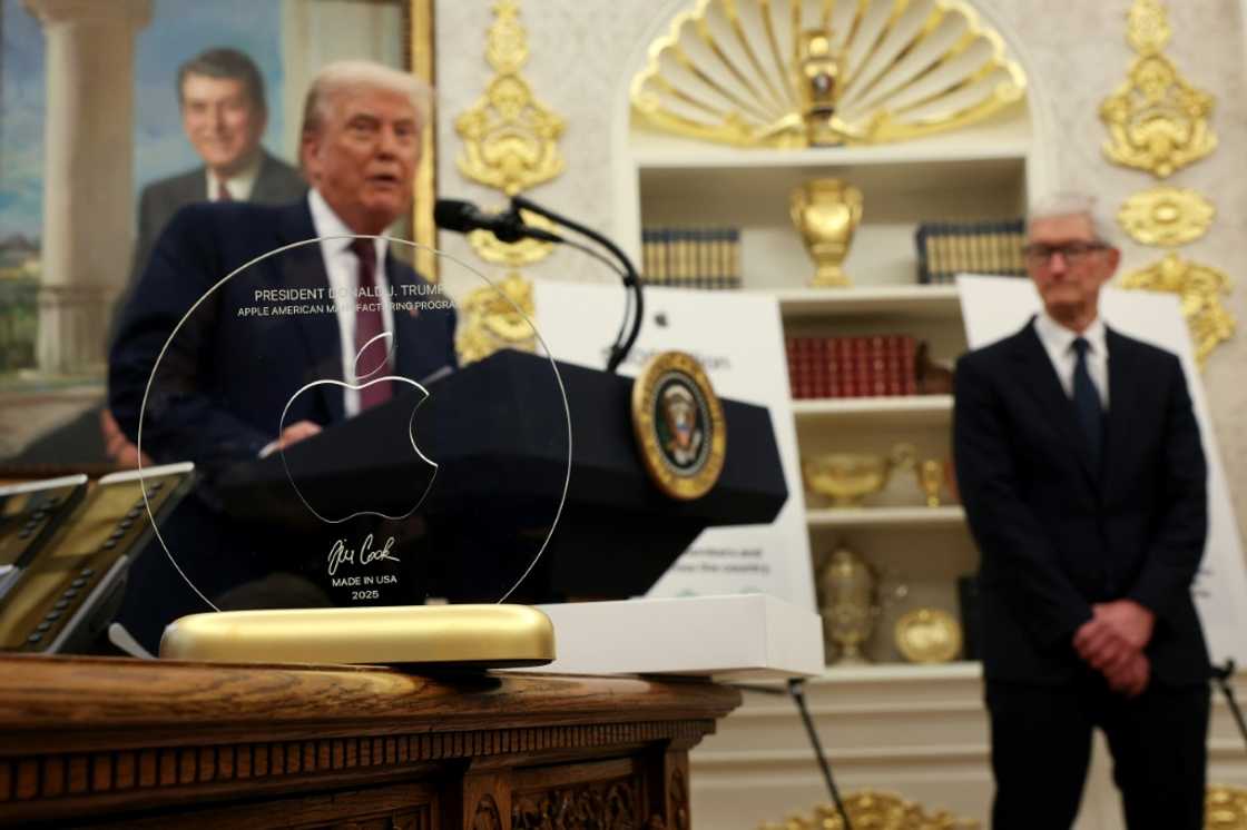 In August, Apple CEO Tim Cook presented President Donald Trump with an engraved glass disc; the company is reportedly considering an investment in Intel, in which the US government holds an equity stake