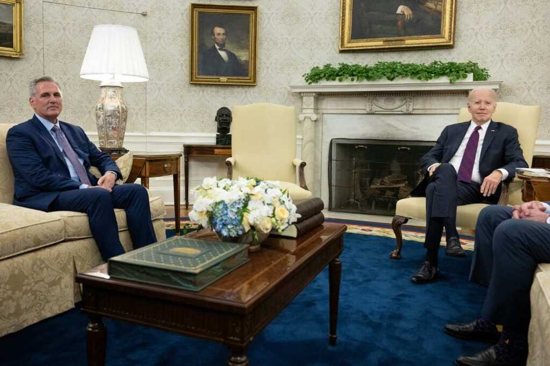 President Joe Biden (R) meets with Republican House Speaker Kevin McCarthy in the Oval Office to discuss a standoff on raising the US debt ceiling President Joe Biden (R) meets with Republican House Speaker Kevin McCarthy in the Oval Office to discuss a standoff on raising the US debt ceiling
