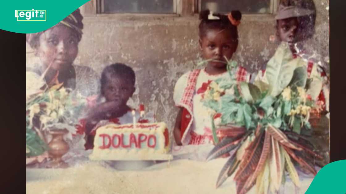 Mother uses one birthday cake for her three children's photos. Mother uses one birthday cake for her three children's photos.