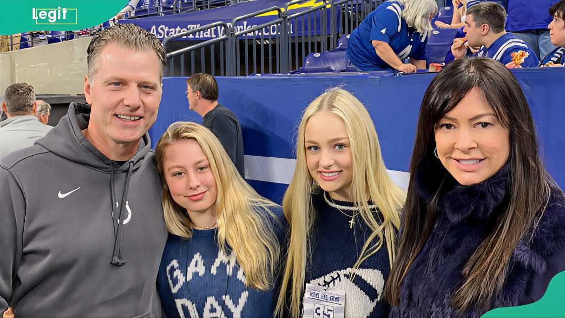 Matt Eberflus with his daughters and wife at the sports stadium