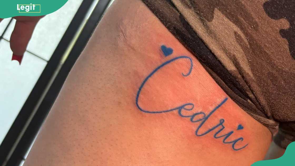 Thigh name tattoo