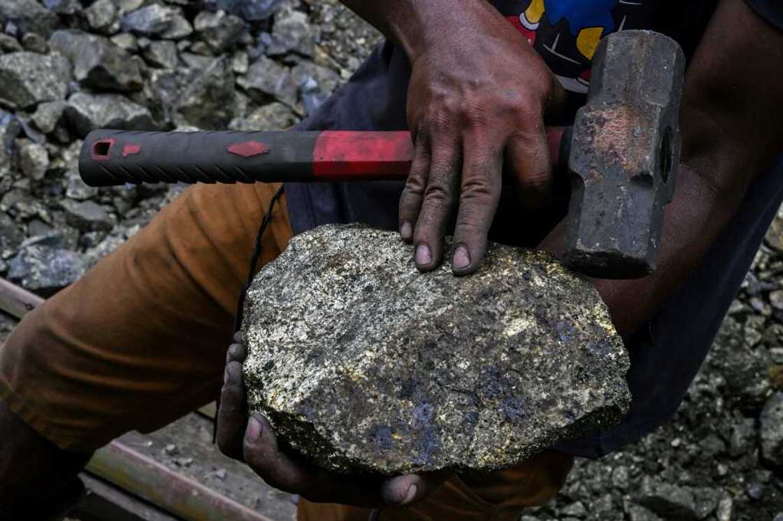 Copper miner Valmir Souza Silva shows off a recent find from one of the 100 or so illegal mines, in Canaa dos Carajas, Para State, Brazil Copper miner Valmir Souza Silva shows off a recent find from one of the 100 or so illegal mines, in Canaa dos Carajas, Para State, Brazil