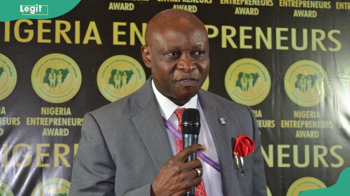 Charles Ayo talking at an event Charles Ayo talking at an event