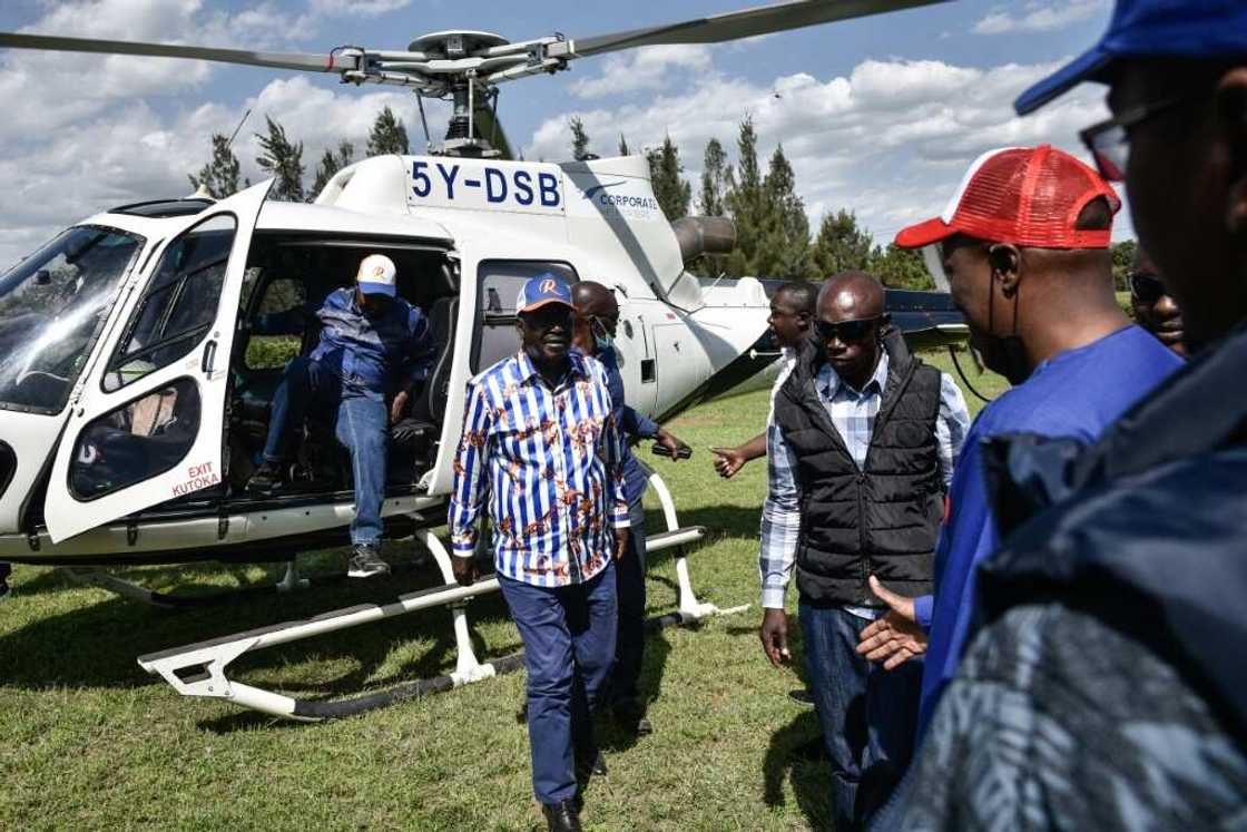 Raila Odinga arrives by helicopter at a rally in the Rift Valley city of Nakuru