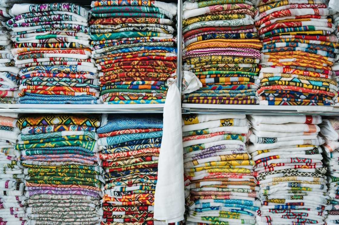 Handwoven fabrics, like these inside Belhu Balta's shop in Shiromeda, Addis Ababa, can make an occasion special, customers say Handwoven fabrics, like these inside Belhu Balta's shop in Shiromeda, Addis Ababa, can make an occasion special, customers say