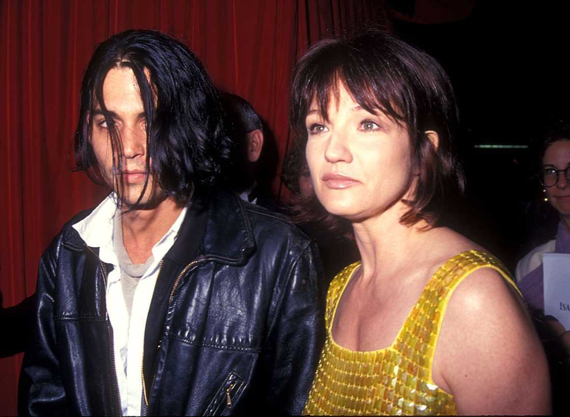 Ellen Barkin and Johnny Depp attend an event together