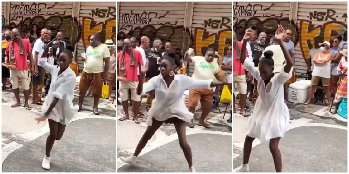 Lady in dress serves sterling dance moves with her legs apart, causes people to fight over her in cute video Lady in dress serves sterling dance moves with her legs apart, causes people to fight over her in cute video