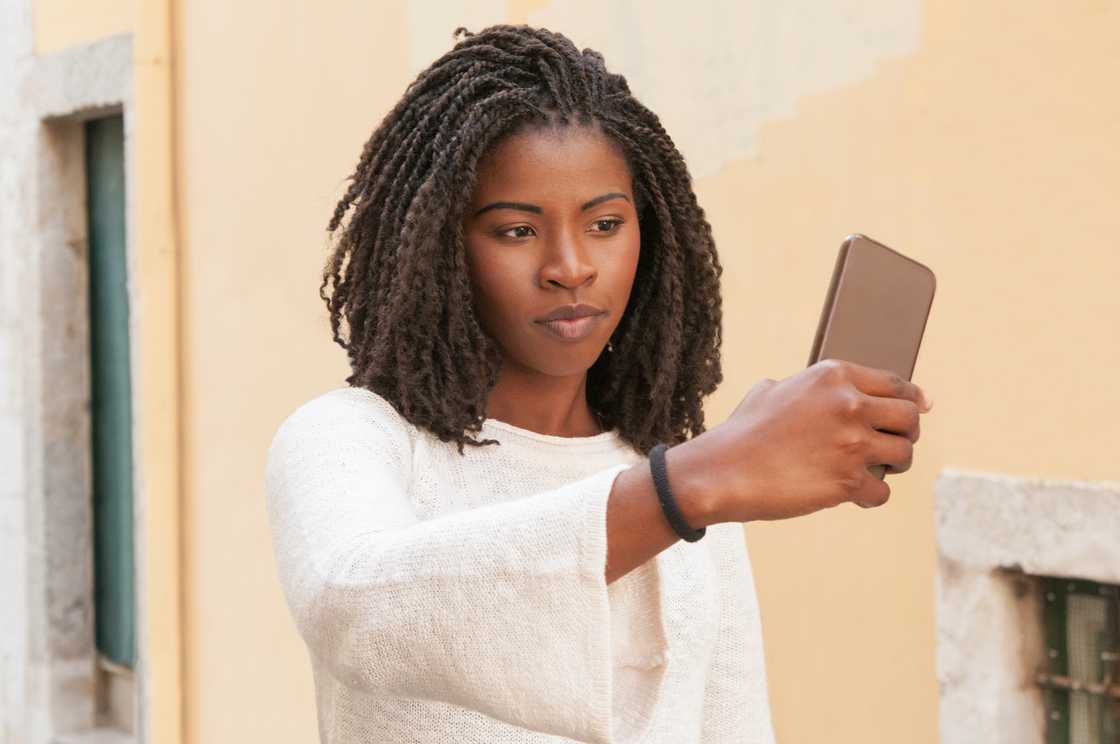 A lady taking a video A lady taking a video