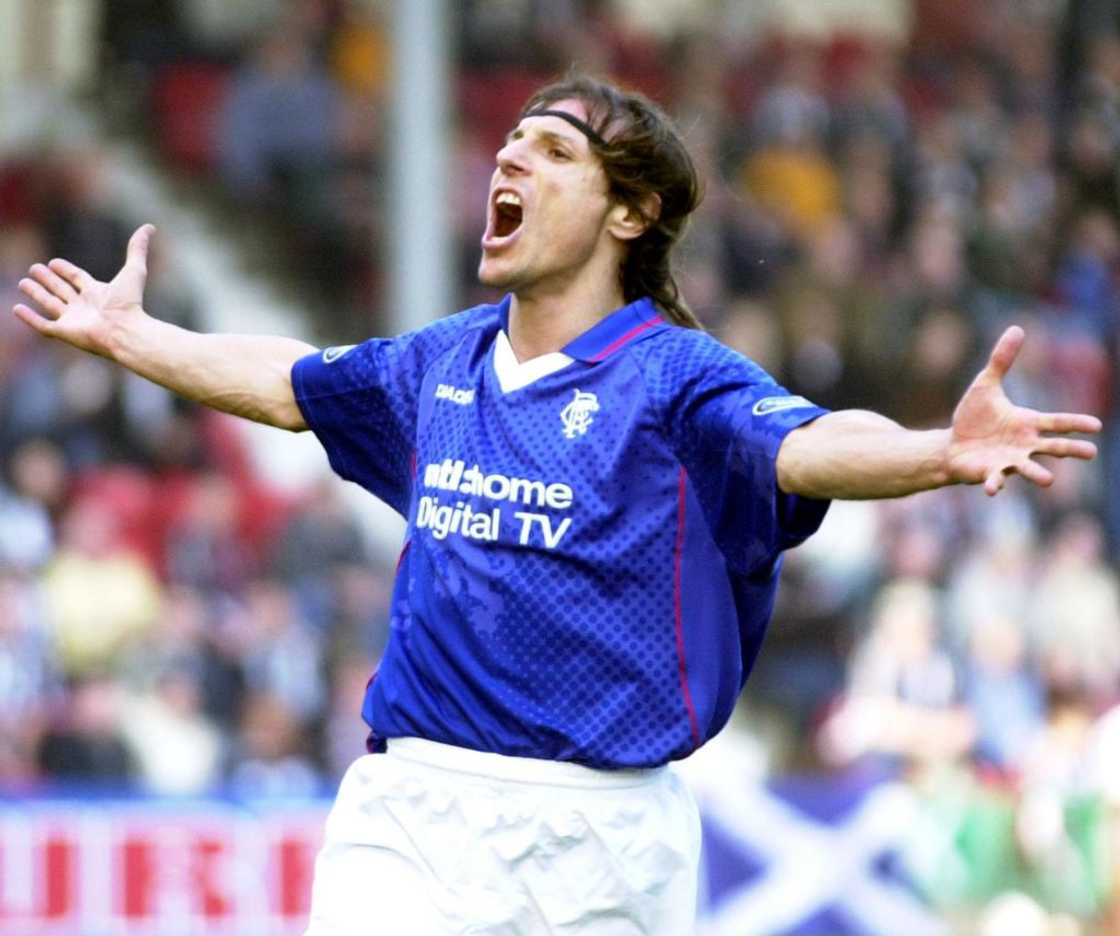 Claudio Caniggia celebrates after scoring a goal for Rangers Claudio Caniggia celebrates after scoring a goal for Rangers