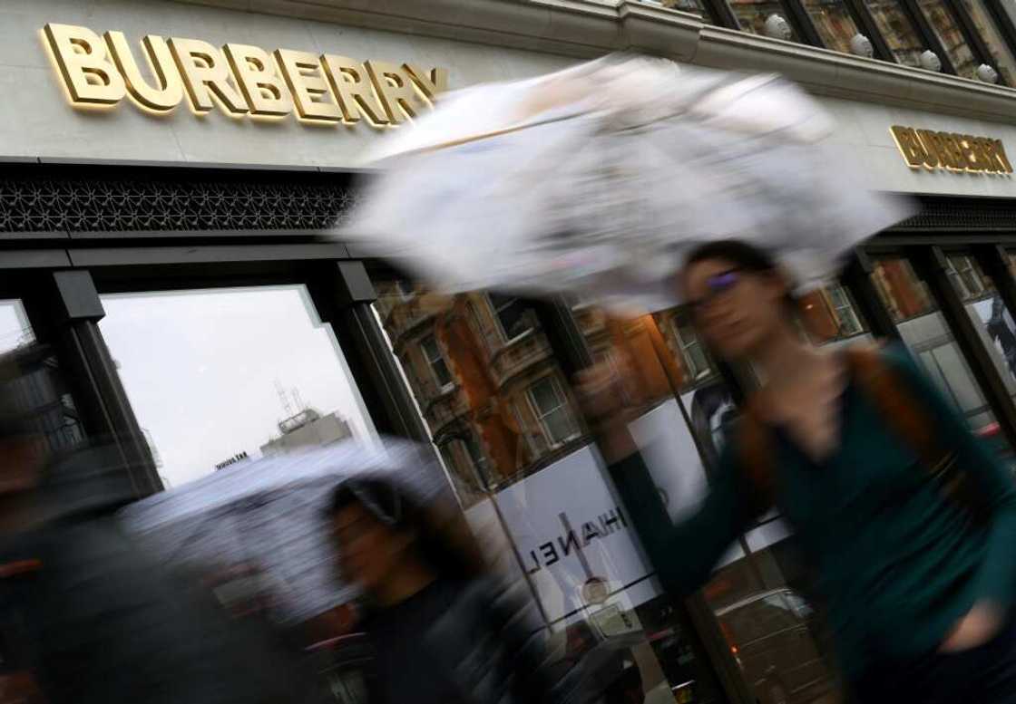 Fashion house Burberry is one of hundreds of companies that held a royal warrant under Queen Elizabeth II Fashion house Burberry is one of hundreds of companies that held a royal warrant under Queen Elizabeth II