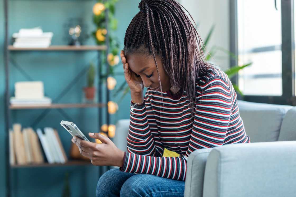 A woman with her head down