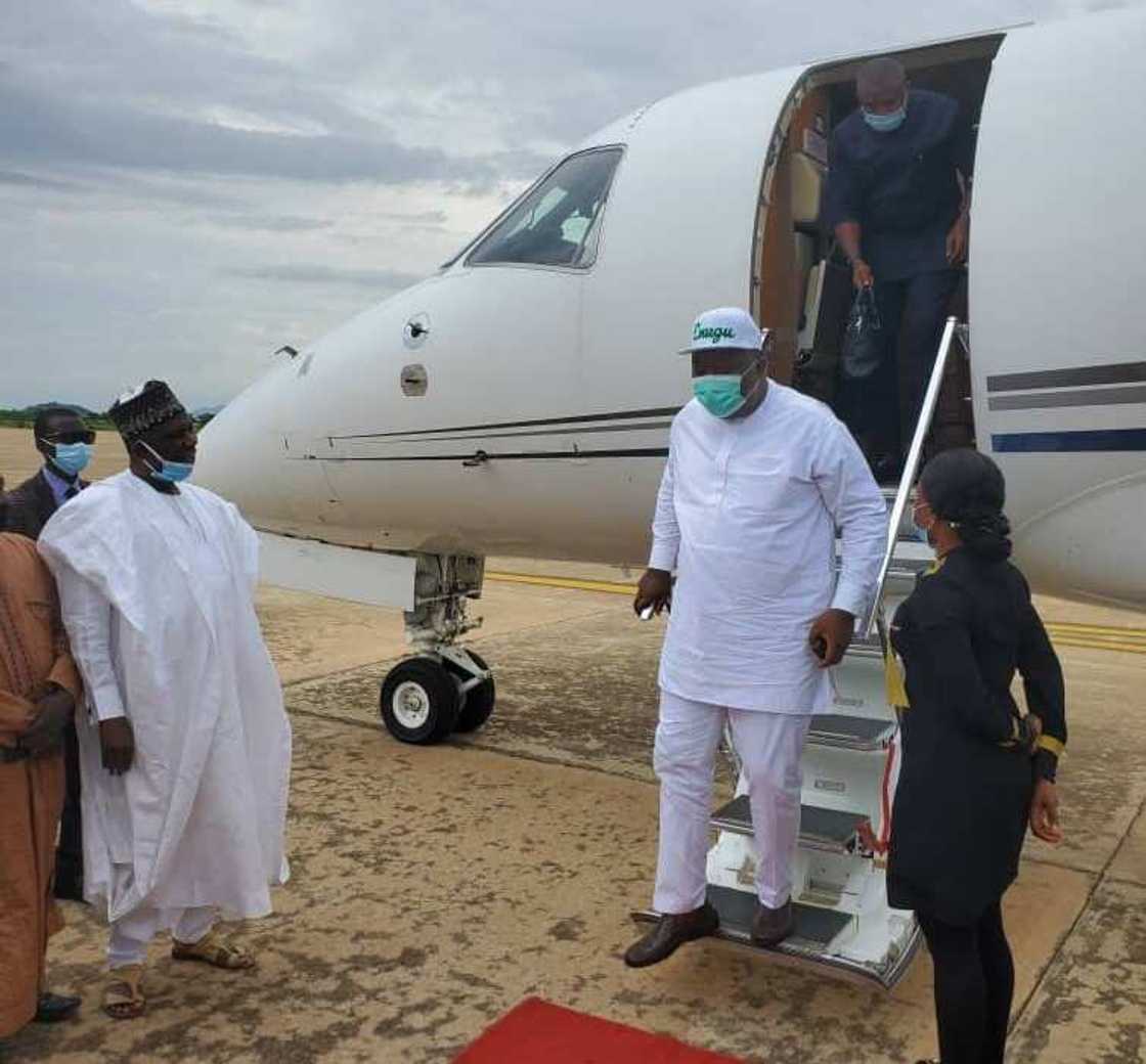 Governor Ugwuanyi getting down from an aircraft Governor Ugwuanyi getting down from an aircraft
