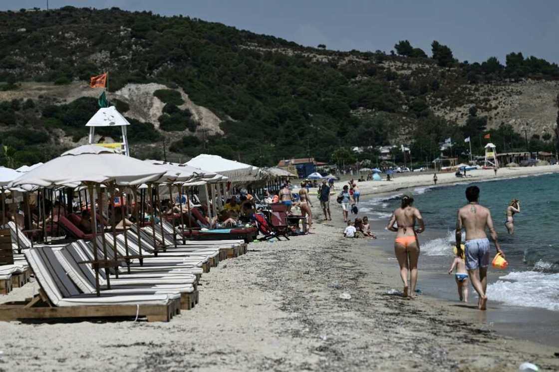 Under new rules, sunbeds have to be at least four metres from the water's edge Under new rules, sunbeds have to be at least four metres from the water's edge