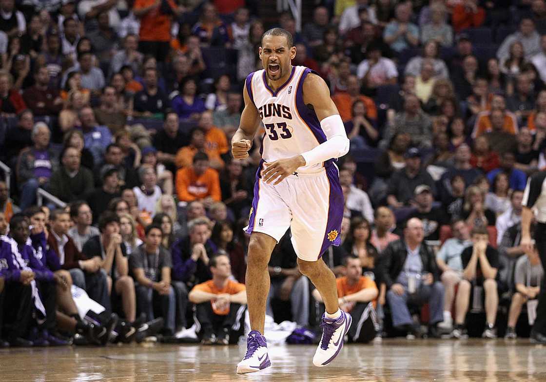 Grant Hill reacts to a non-foul call during an NBA game Grant Hill reacts to a non-foul call during an NBA game