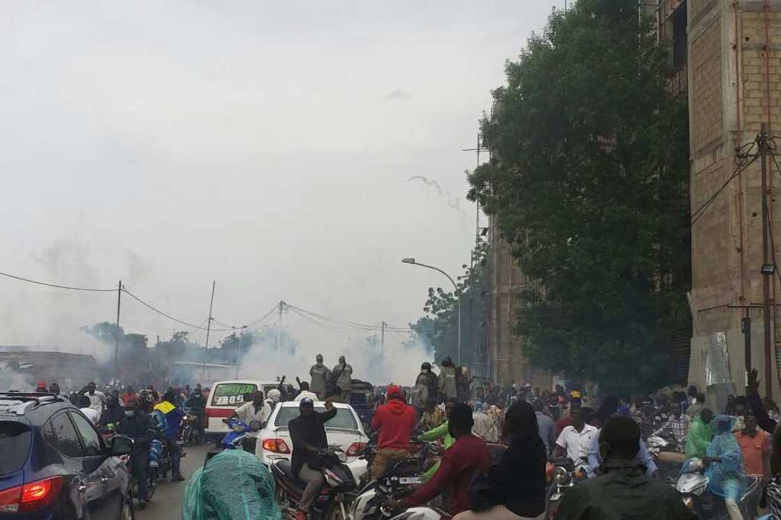 Police fired tear gas to disperse a large crowd surrounding opposition leader Succes Masra's car Police fired tear gas to disperse a large crowd surrounding opposition leader Succes Masra's car