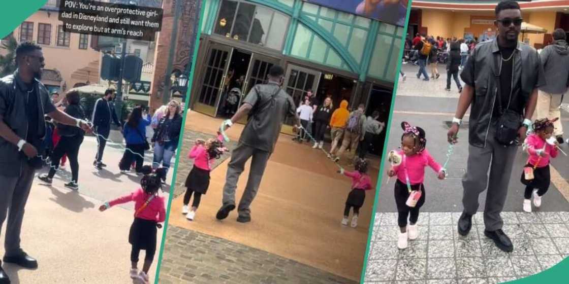 People stare as father uses leash to keep his daughters at arms length People stare as father uses leash to keep his daughters at arms length