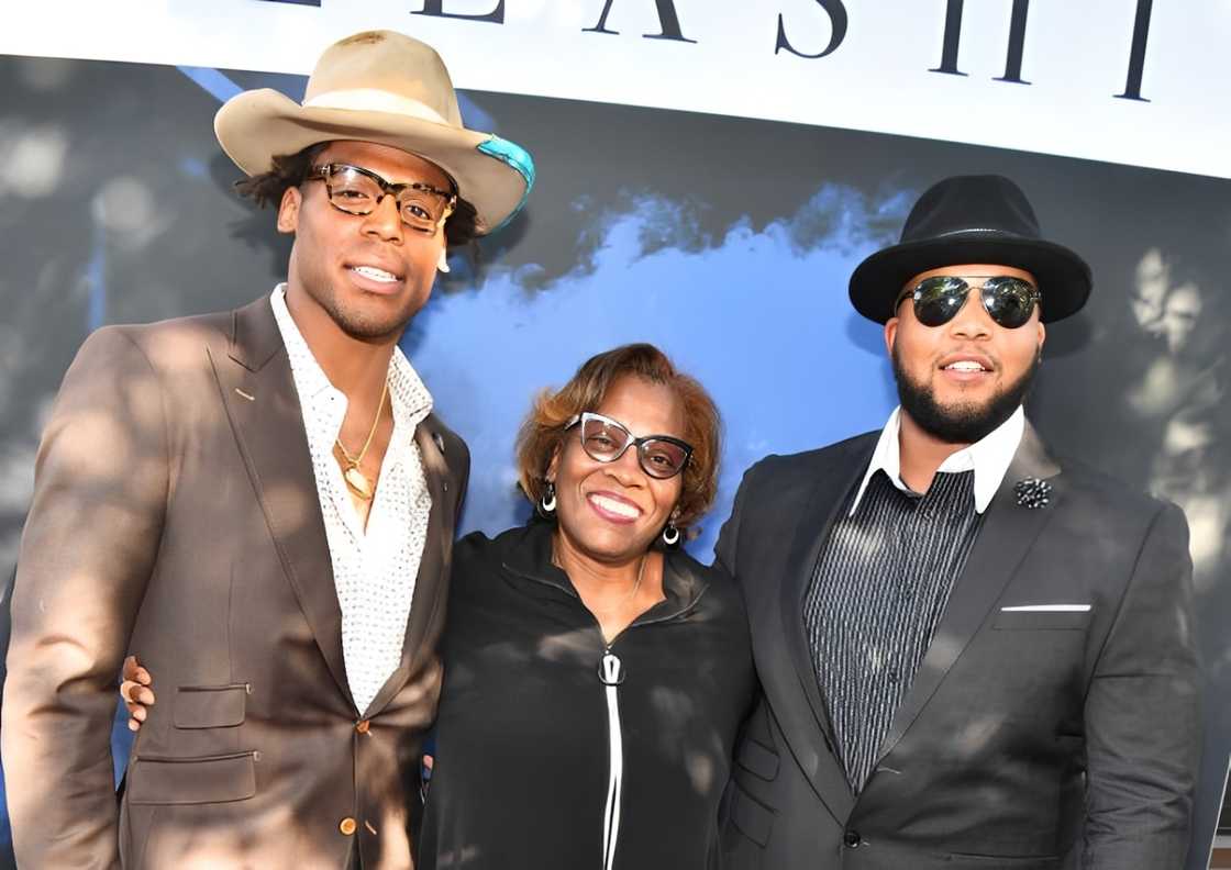 NFL Player Cam Newton his mother Jackie Newton, and brother C.J. Newton