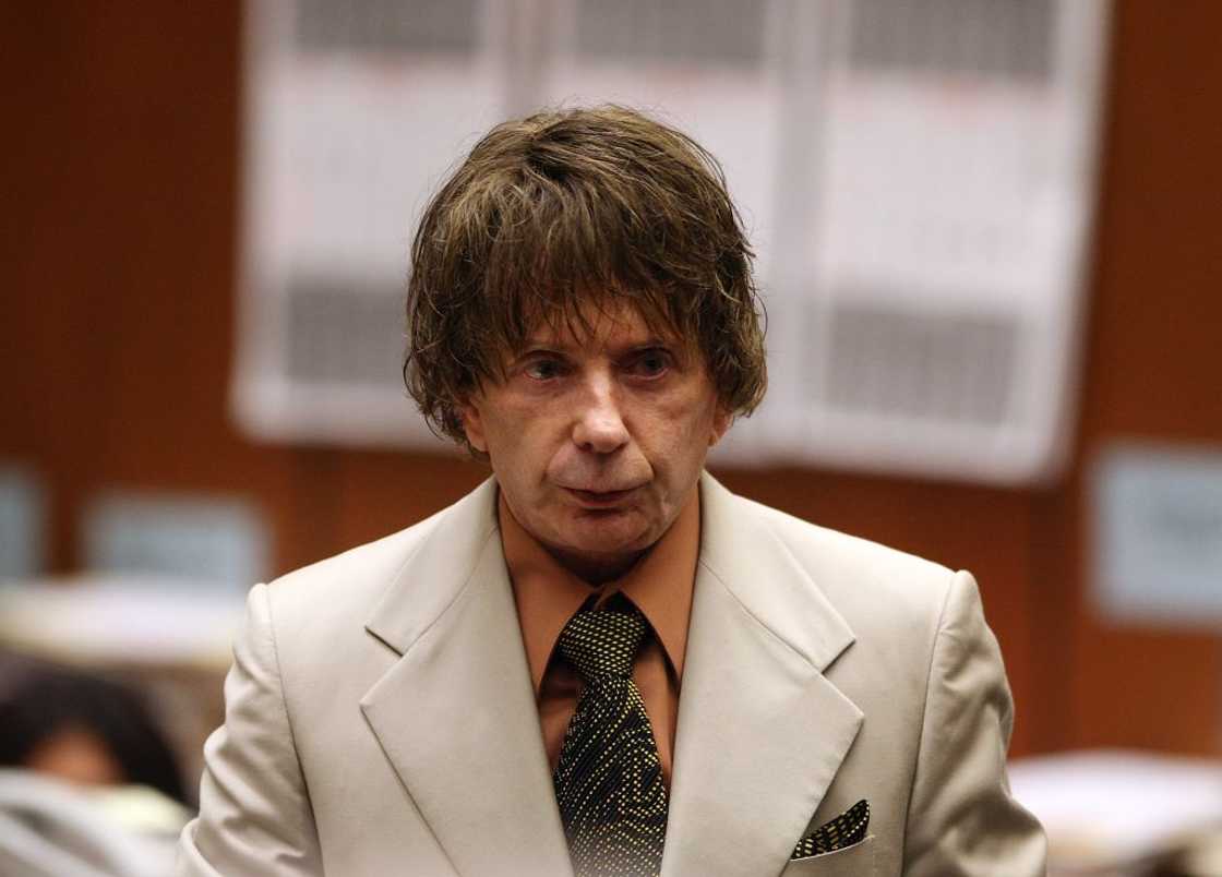 Music producer Phil Spector stands for a break during his murder trial in Los Angeles, California. Music producer Phil Spector stands for a break during his murder trial in Los Angeles, California.