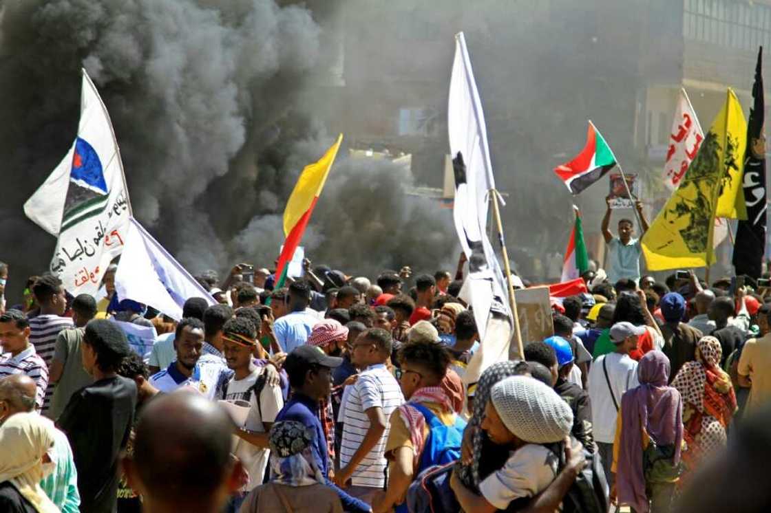 Protesters in Khartoum on Tuesday marching against a military coup: for 12 months, near weekly anti-coup protests have been met with force