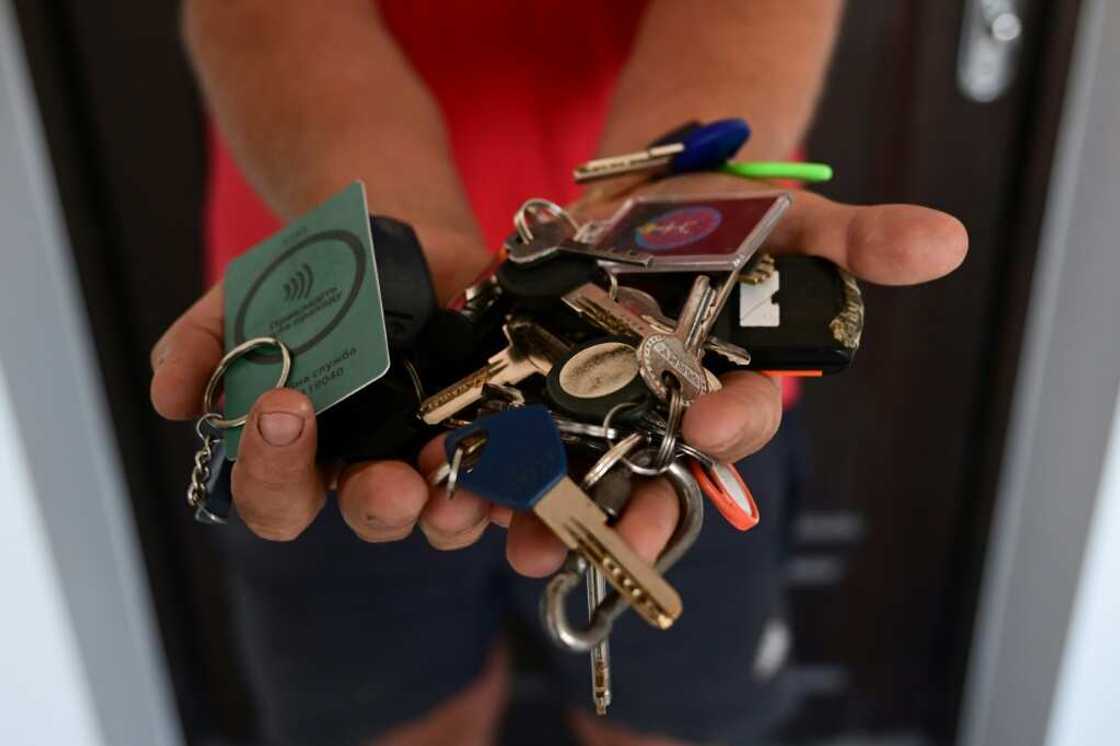 Yevgen Yelpitiforov, the keeper of Irpin's keys, left to him by friends who have fled their homes in Ukraine Yevgen Yelpitiforov, the keeper of Irpin's keys, left to him by friends who have fled their homes in Ukraine