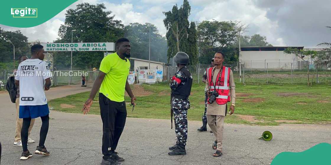 Protester confronting police in Abuja Protester confronting police in Abuja