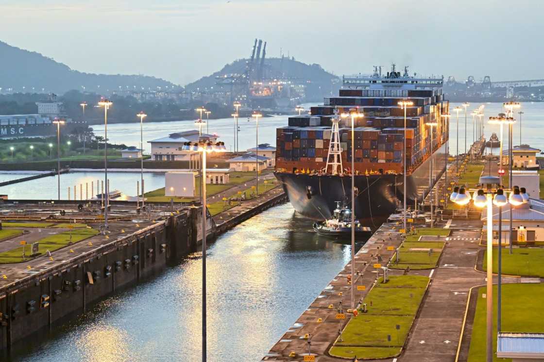 A cargo ship transits through Panama Canal locks A cargo ship transits through Panama Canal locks